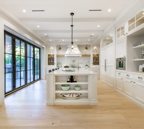 Elegant modern farmhouse interior kitchen dining with bar white marble charcoal grey chairs bar stools and decor