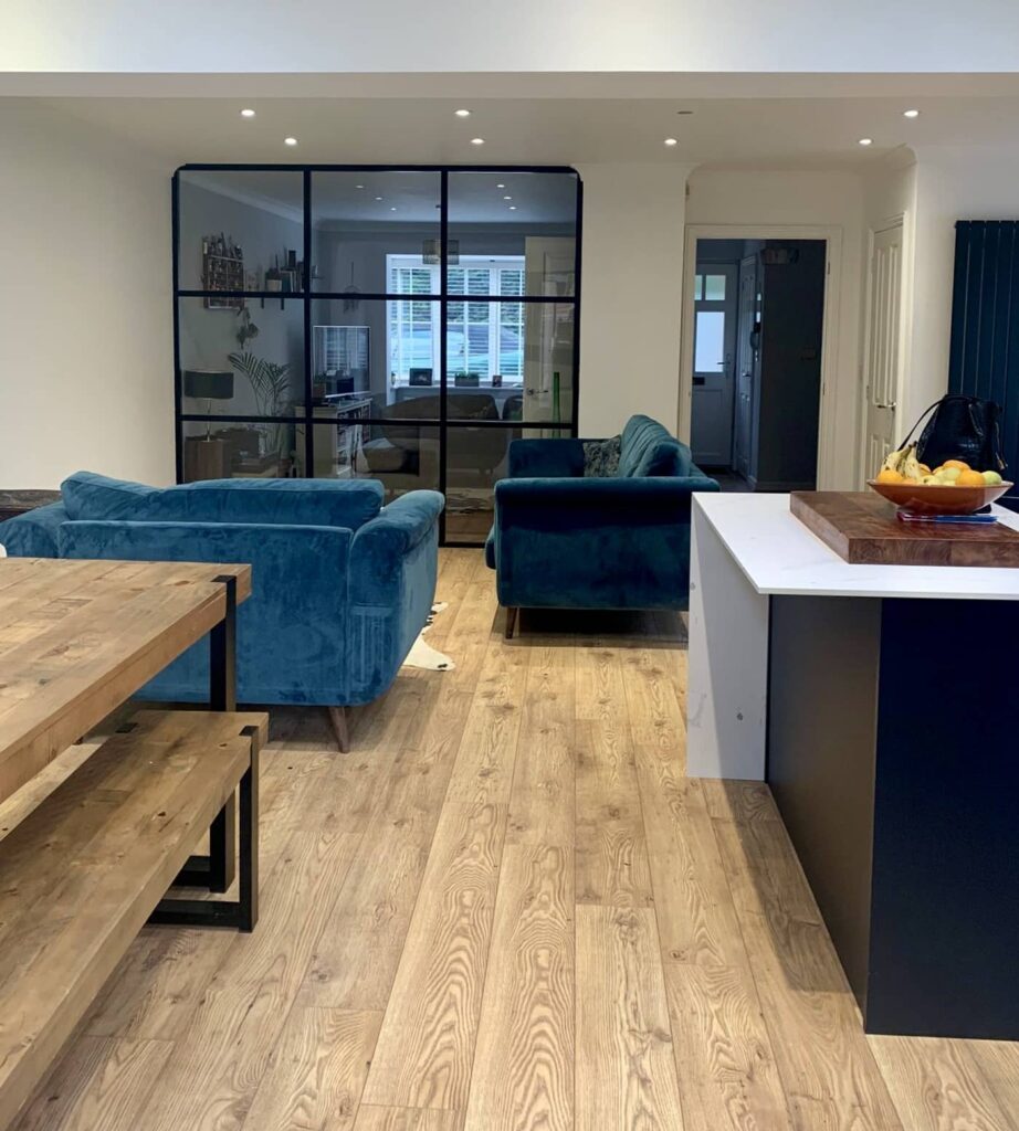 interior screens in a kitchen diner separating a lounge for single glazed or double glazed information article