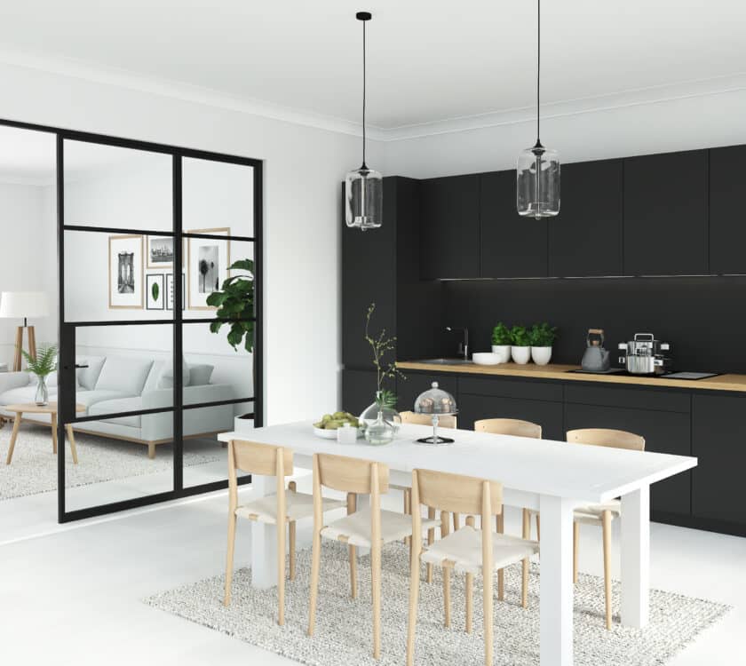 black steel look interior doors between a kitchen and large lounge